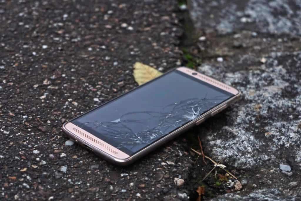 broken cellphone that has no power and has crack on screen